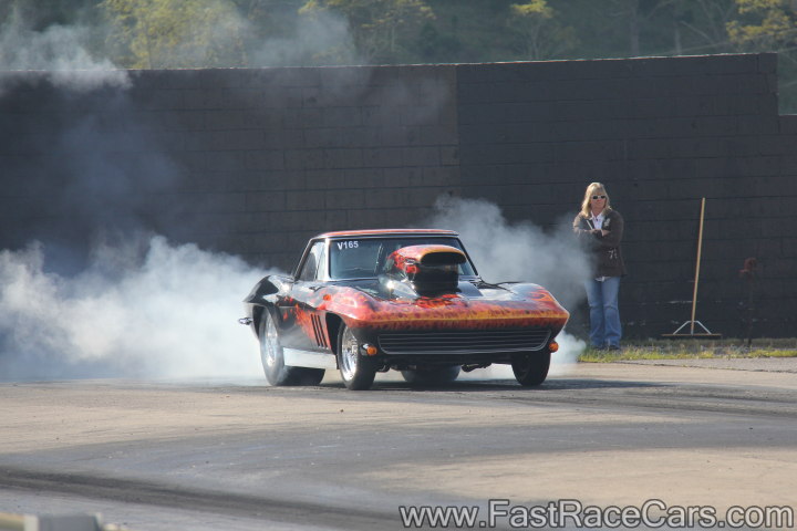 Black Corvette Doing Burnout